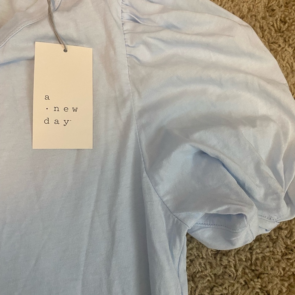New with tags blue top